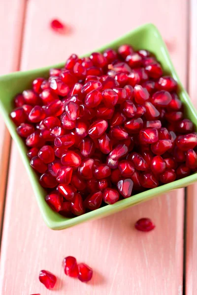 Pomegranate Seeds Bowl Wooden Surface — Stock Photo, Image