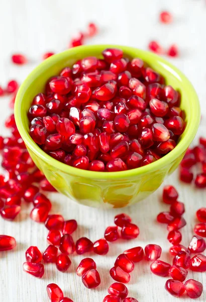Pomegranate Seeds Bowl Wooden Surface — Stock Photo, Image