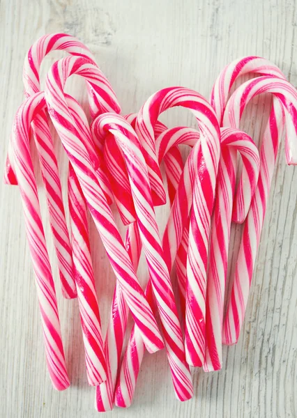 Striped Christmas Candies Wooden Surface — Stock Photo, Image