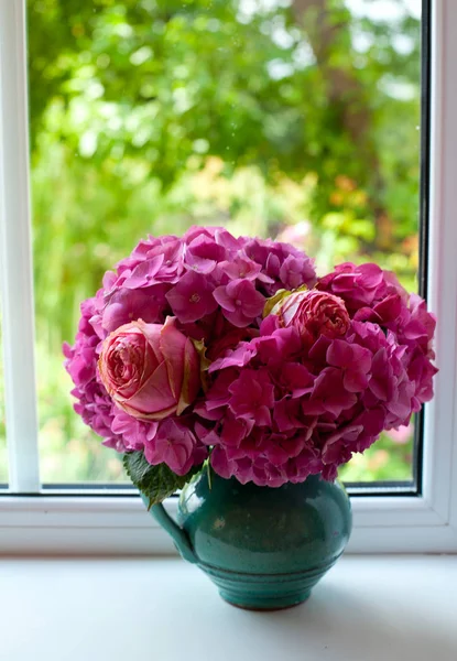 flowers and window, close up view