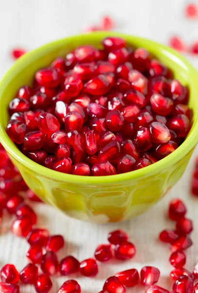 Pomegranate Seeds Bowl Wooden Surface — Stock Photo, Image