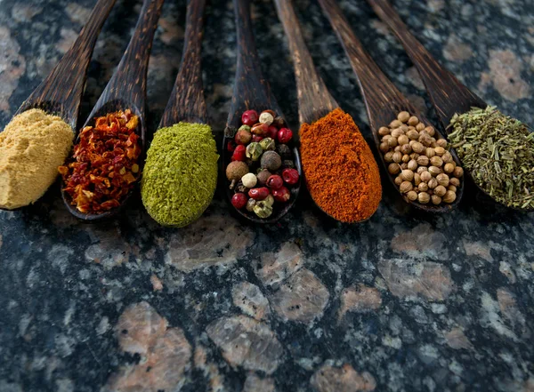 Different Spices Wooden Spoons — Stock Photo, Image