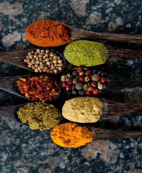 Different Spices Wooden Spoons — Stock Photo, Image