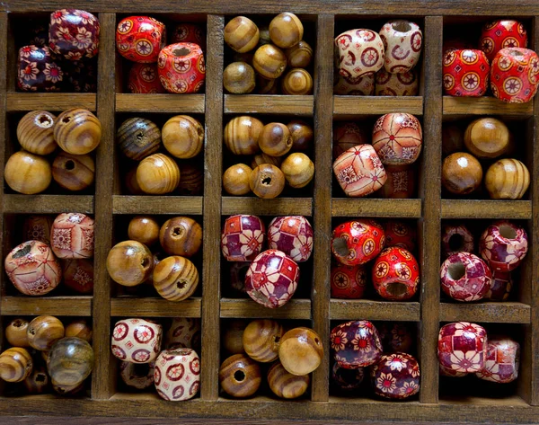 Different Colorful Wooden Beads — Stock Photo, Image