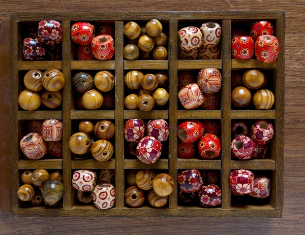 Different Colorful Wooden Beads — Stock Photo, Image