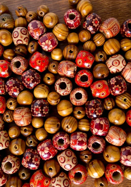 Different Colorful Wooden Beads — Stock Photo, Image