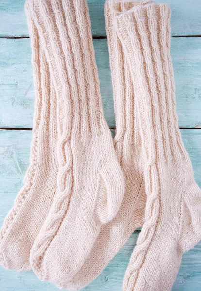 hand knitted long socks with braids