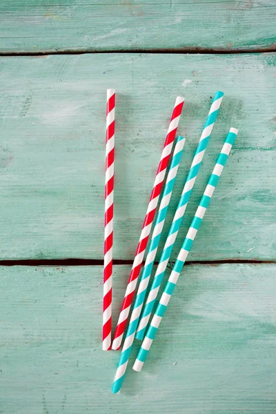 Striped Paper Straws Turquoise Wooden Background — Stock Photo, Image