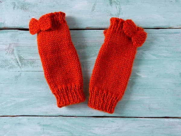 Orange Hand Knitted Mittens Wooden Surface — Stock Photo, Image