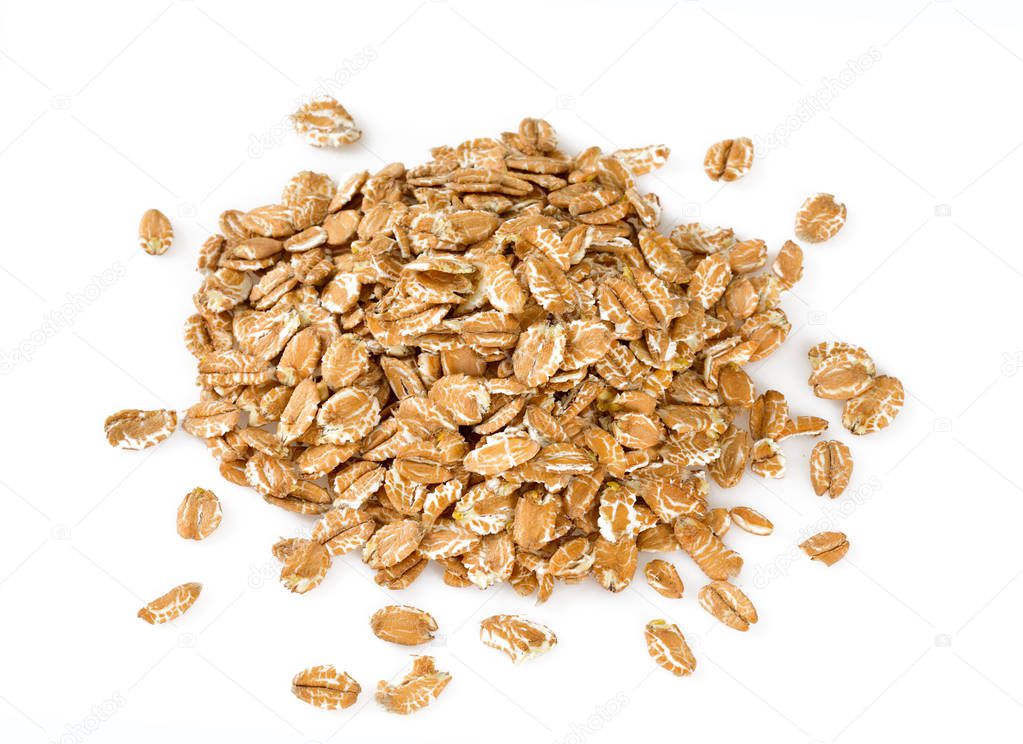 spelt flakes isolated on white