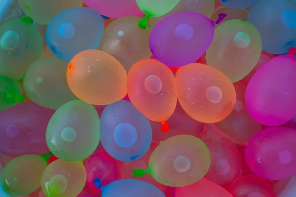 many colorful water balloons