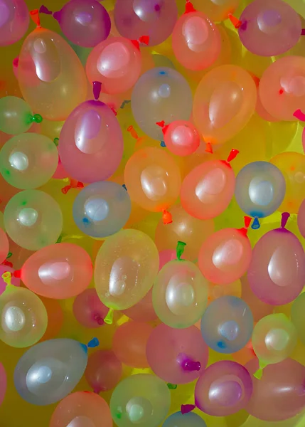 many colorful water balloons