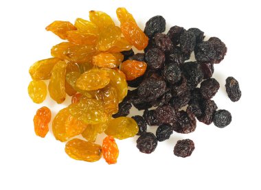 close-up view of black and yellow raisins isolated on white background clipart