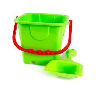 Bebek Oyuncak kova ve kürek üzerinde izole beyaz komisyon