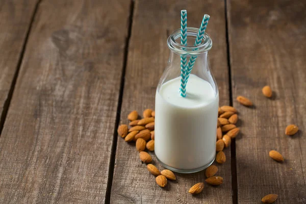Bottle Healthy Almond Milk Wooden Surface — Stock Photo, Image