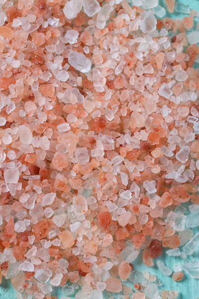 Himalayan Salt on turquoise wooden surface