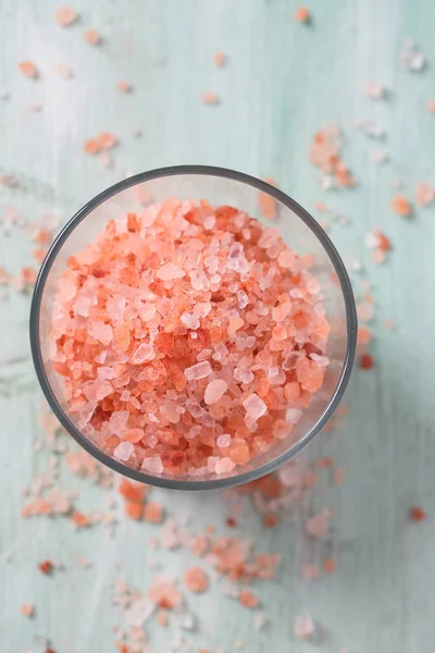 Himalayan Salt on turquoise wooden surface