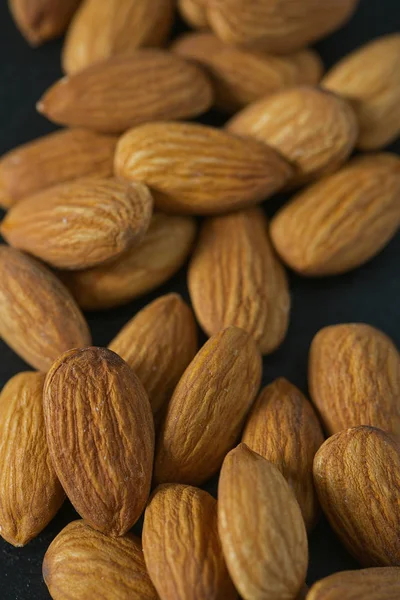 Almonds Black Surface — Stock Photo, Image