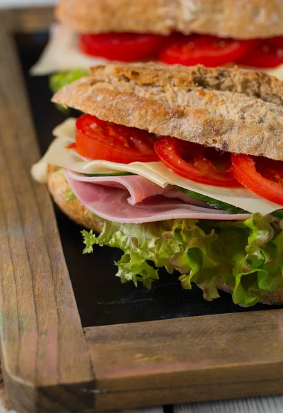 Wholegrain Ciabatta Sandwiches Lettuce Tomatoes Ham Cheese — Stock Photo, Image