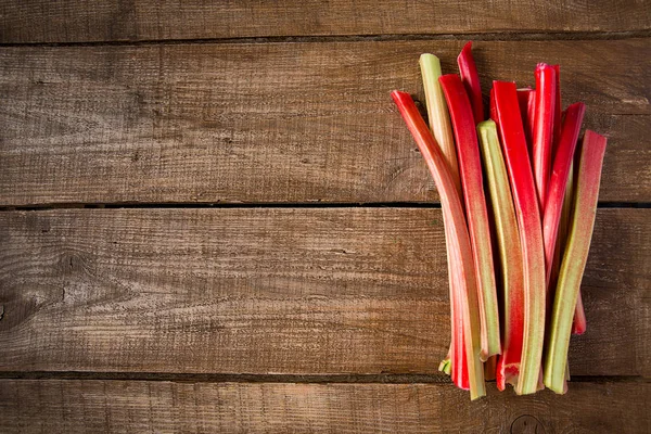 Close View Healthy Rhubarb Stems Wooden Surface — Stock Photo, Image