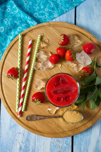 fresh strawberry lemonade on wooden surface