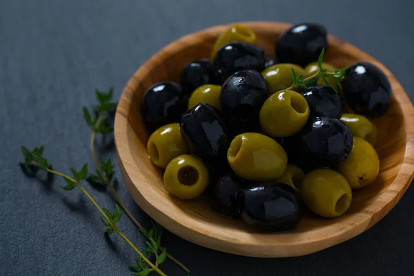Olives Wooden Bowl Black Surface — Stock Photo, Image