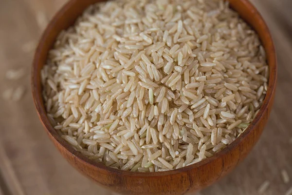 Arroz Integral Uma Tigela Mesa Madeira — Fotografia de Stock