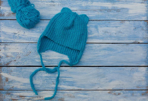 blue knitted hat for babies