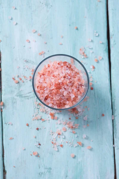 Himalayan Salt on turquoise wooden surface