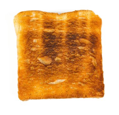 beyaz zemin üzerinde yanmış tost