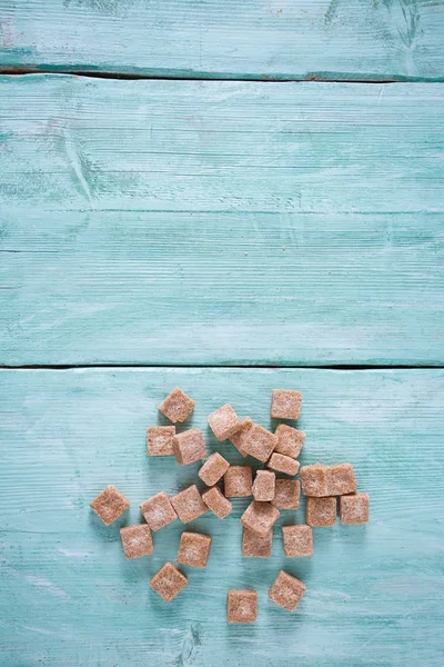 Hnědý Cukr Trquoise Pozadí — Stock fotografie
