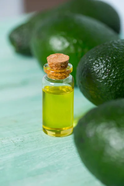 avocado oil on wooden surface