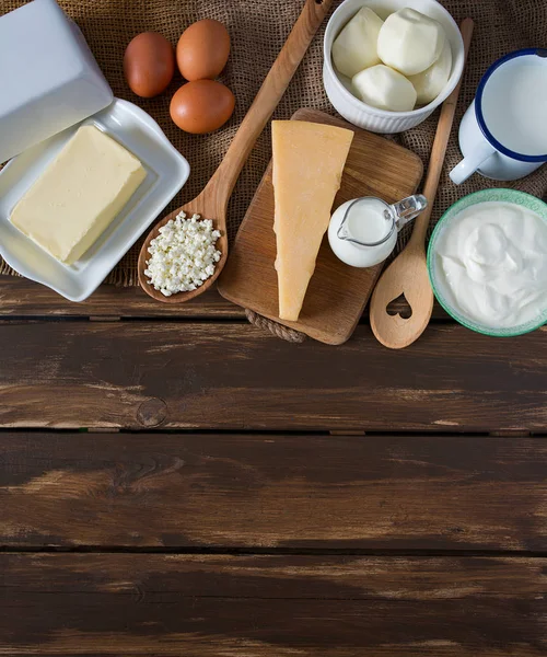 Dairy products on wooden surface — Stock Photo, Image