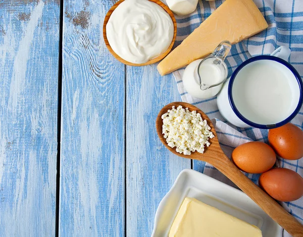 Dairy products on wooden surface — Stock Photo, Image