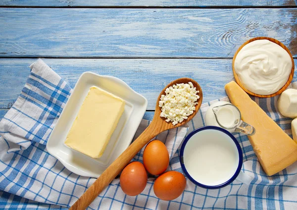 Dairy products on wooden surface — Stock Photo, Image