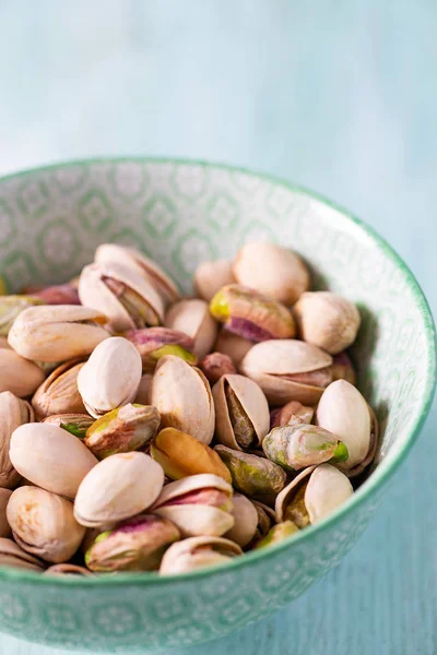 Peanuts on wooden surface — Stock Photo, Image