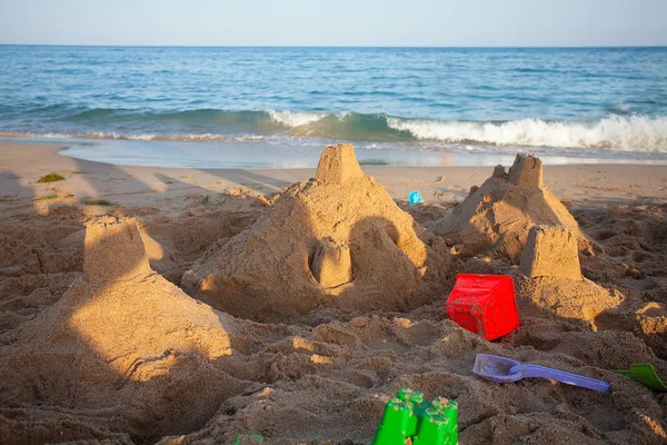 Sand castle on sea shore