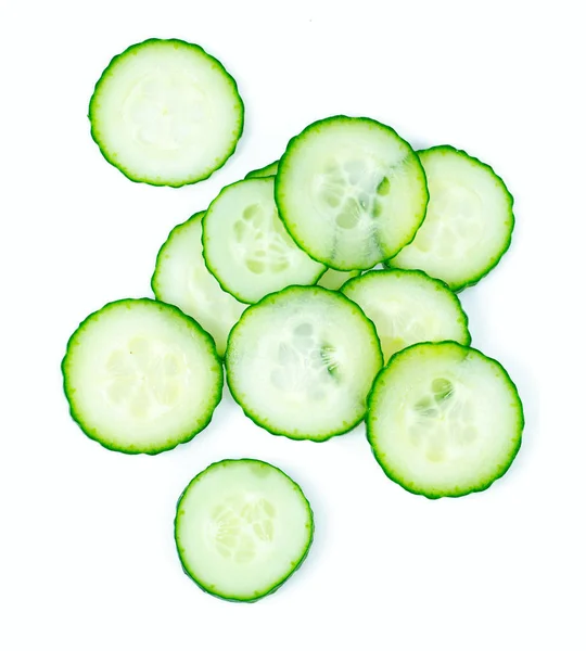 Cut cucumbers isolated on white — Stock Photo, Image