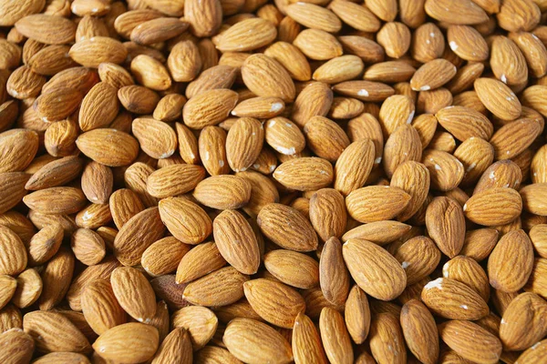 Almond nut background, macro shot — Stock Photo, Image