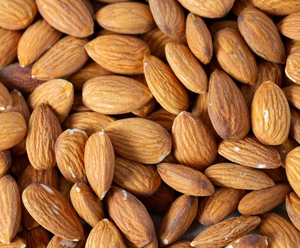 Almond nut background, macro shot — Stock Photo, Image