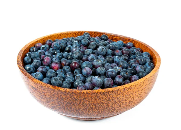 Fresh blueberries in a wooden bowl — Stock Photo, Image