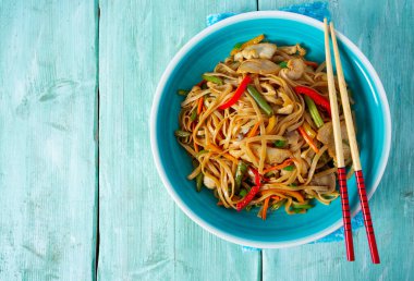 asian noodles with vegetables and mushrooms clipart