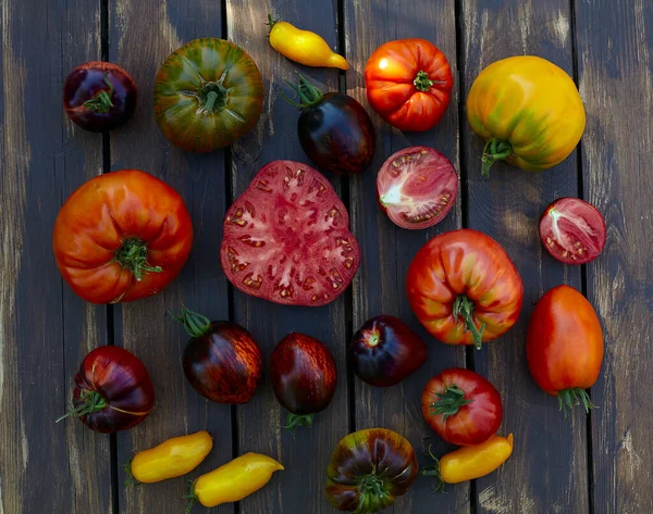 Assortment Tomatoes Brown Wooden Surface — Stock Photo, Image