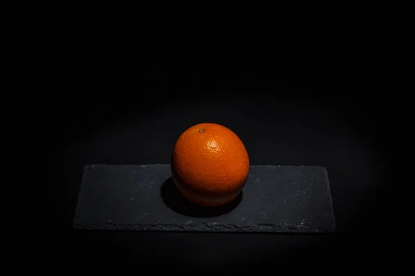 Arancione Maturo Fondo Nero Superficie Nera — Foto Stock