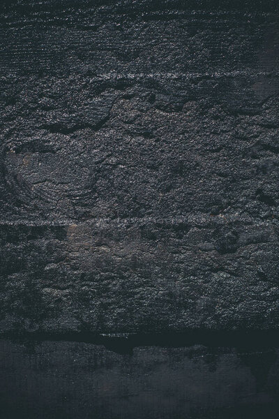 Текстура черной смолы с царапинами и трещинами
.