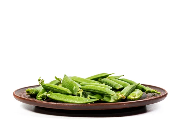 Lekkere Groene Erwten Met Vitaminen Een Wit Bord Van Een — Stockfoto