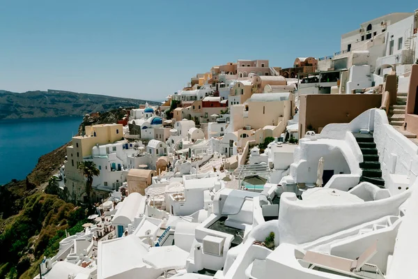 White houses, luxuty villas and hotels in Oia, Santorini island, Greece