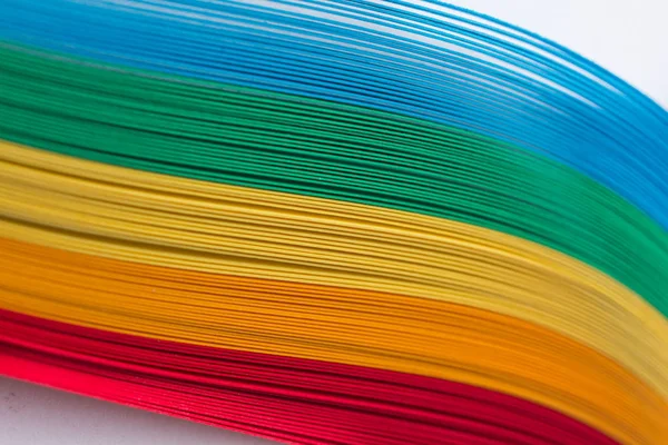Forniture artigianali - nastri, colori di carta arcobaleno, isolati su bianco — Foto Stock