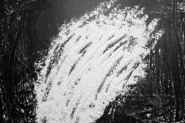 Біле борошно посередині на чорному фоні текстури малюнки з Стокове Фото