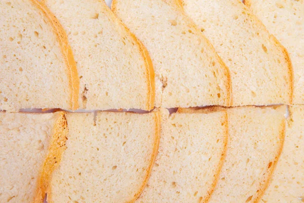 Sneetjes wit brood. Close-up van heerlijke croutons. — Stockfoto